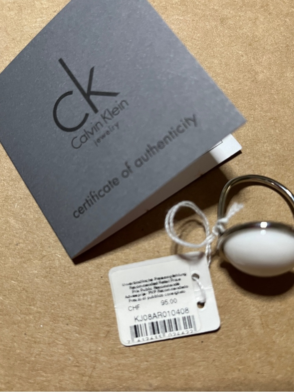 Calvin Klein Women's Silver Ring with White Oval Stone.       Size 9